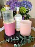 Sacred Space Collection — pink frosted candle vessels, room spray, and reed diffuser styled together | New Moon Apothecary
