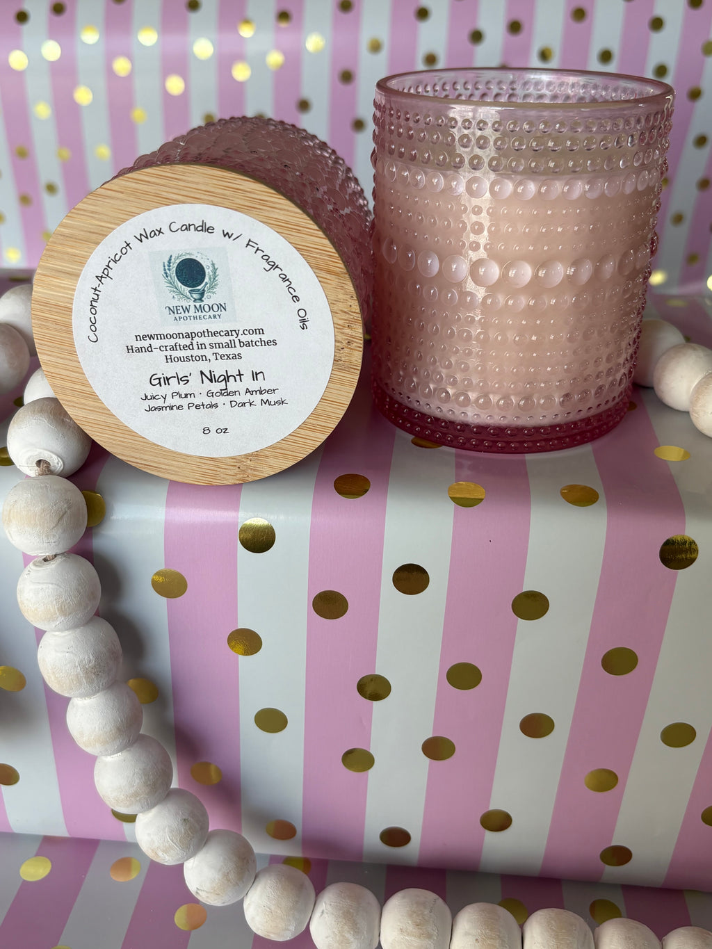 Girls Night In candle label showing juicy plum, golden amber, jasmine petals, and dark musk
