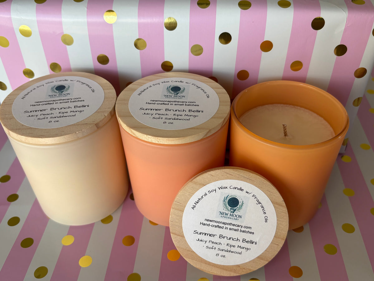 Summer Brunch Bellini 8 oz candle in peach and cream frosted vessels